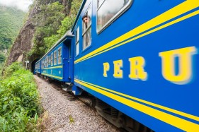 Peru Rail train passing on the tracks to Aguas Calientes, Peru, South America