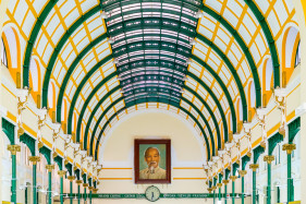 Portrait of Ho Chi Minh and colonial interior of Saigon Central Post Office, Hồ Chí Minh City (Saigon), Vietnam