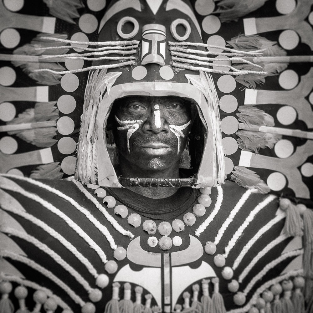 A participant in the Ati-atihan parade wearing a hand-made-made costume made from natural and salvaged materials. Ati-Atihan festival in honor of Santo Niño takes place yearly in Kalibo, Aklan, Western Visayas, Philippines.