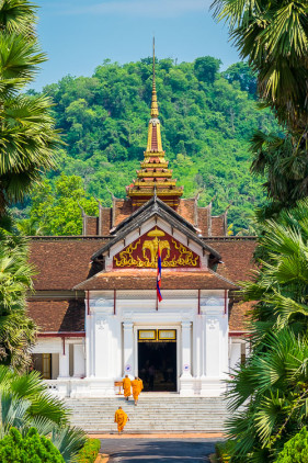 Monks entering Royal Palace Museum in Luang Prabang, Louangphabang Province, Laos